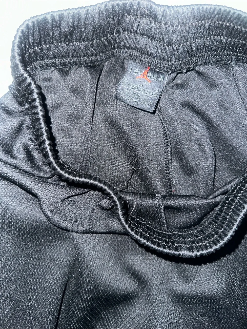 Kids Size M Nike Black Boys' Shorts with White Swoosh and Maroon Accent